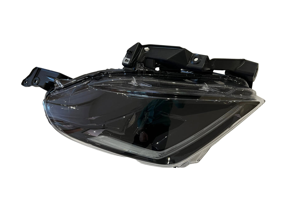 Car headlight assembly on a white background