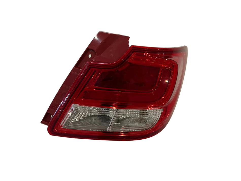 Red car tail light on a white background