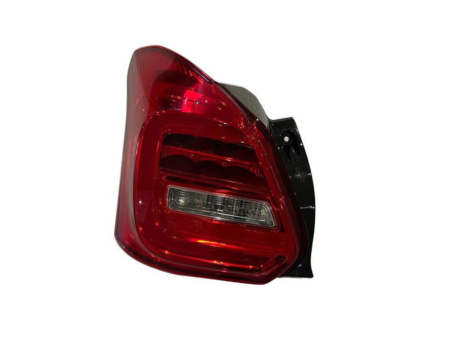 Red car tail light on a white background