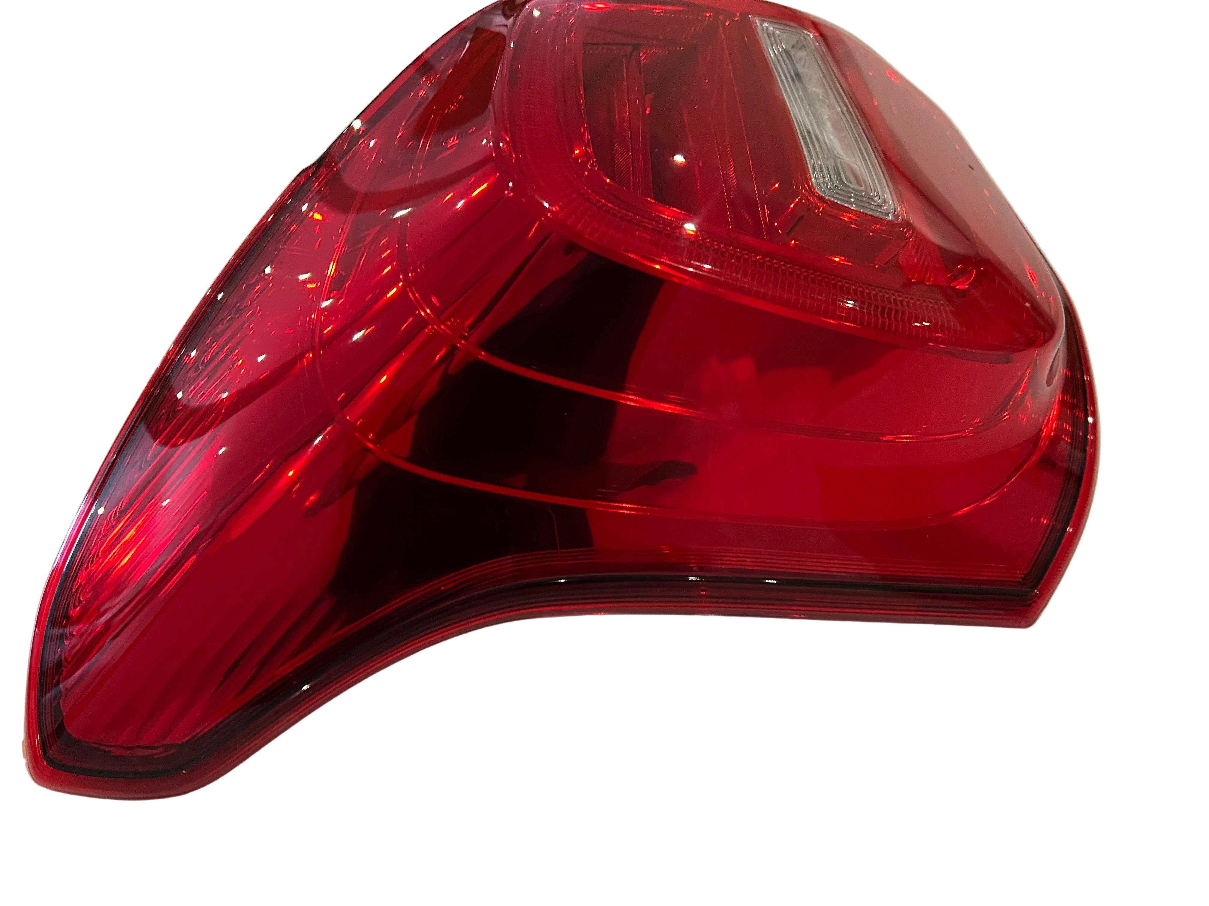 Red car tail light on a white background